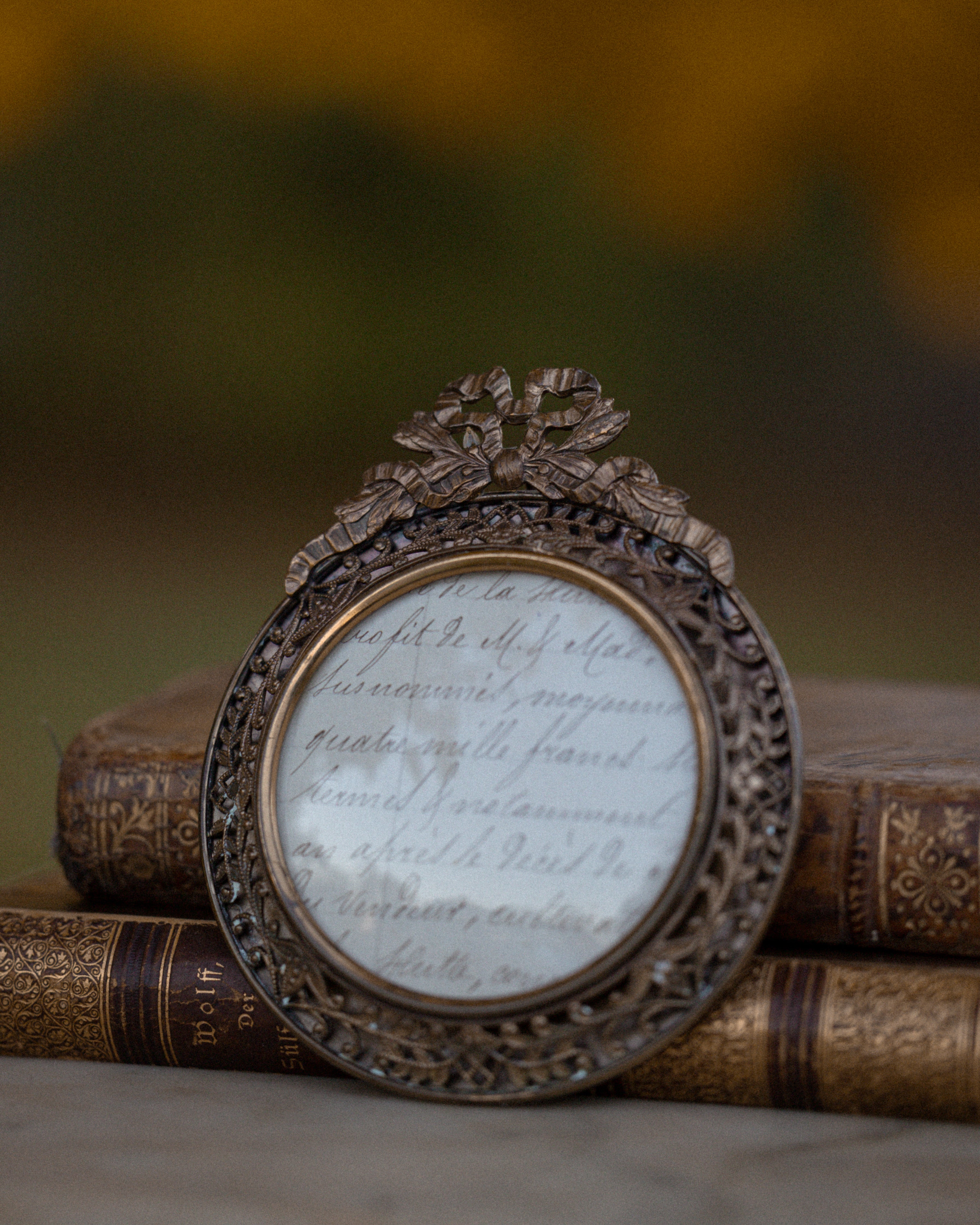 (B) Round Brass Frame w/ Bow Motif