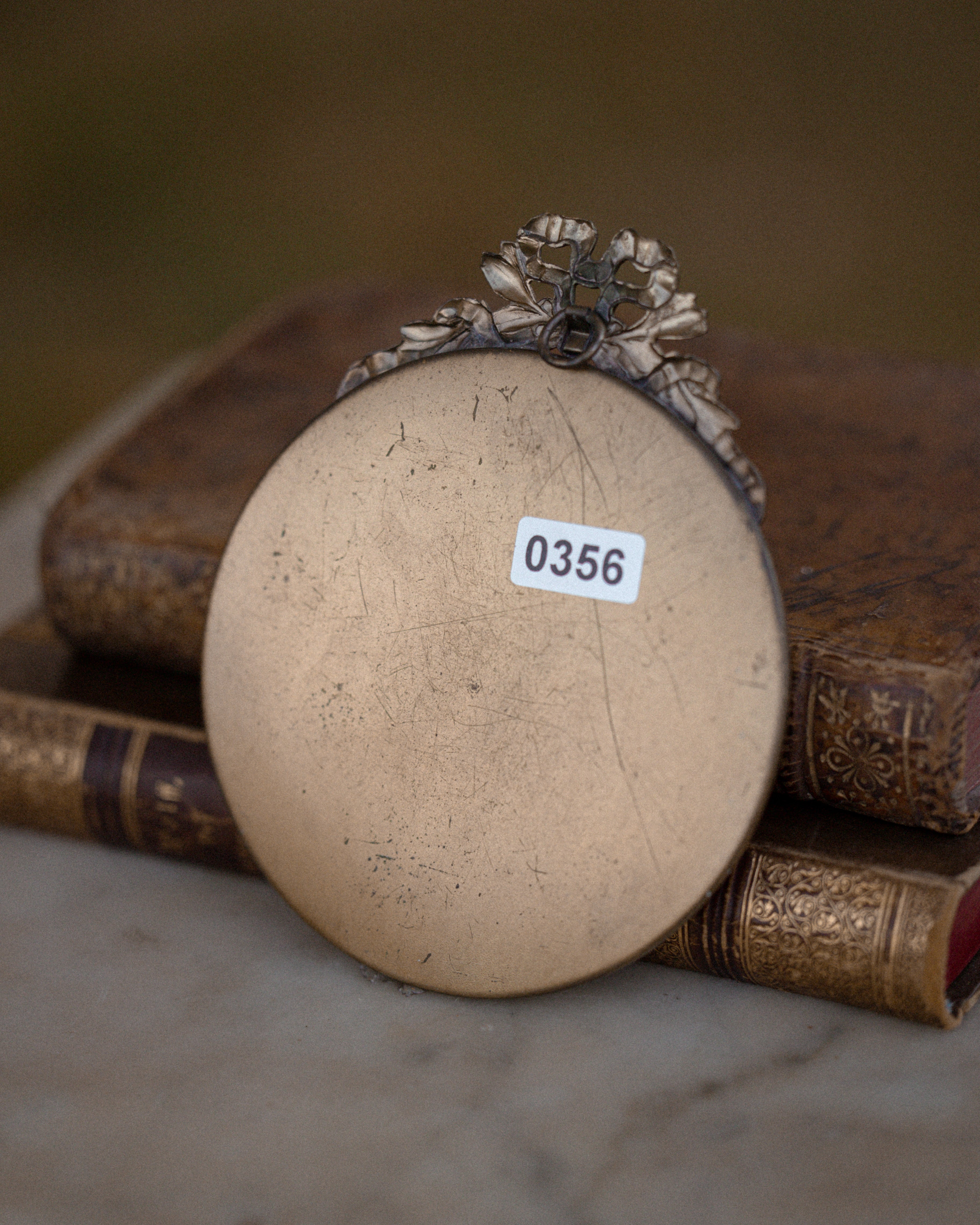 (A) Round Brass Frame w/ Bow Motif