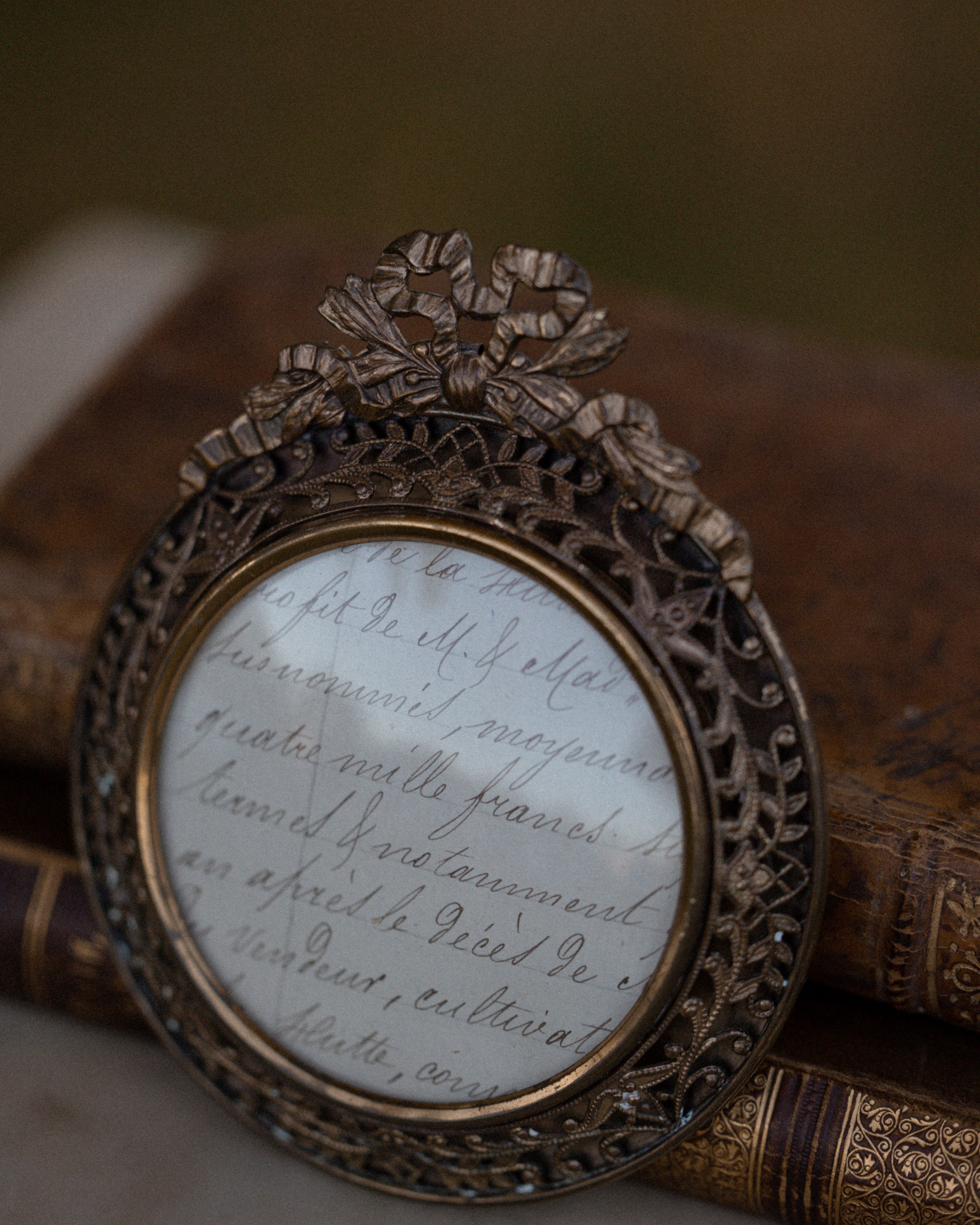 (B) Round Brass Frame w/ Bow Motif