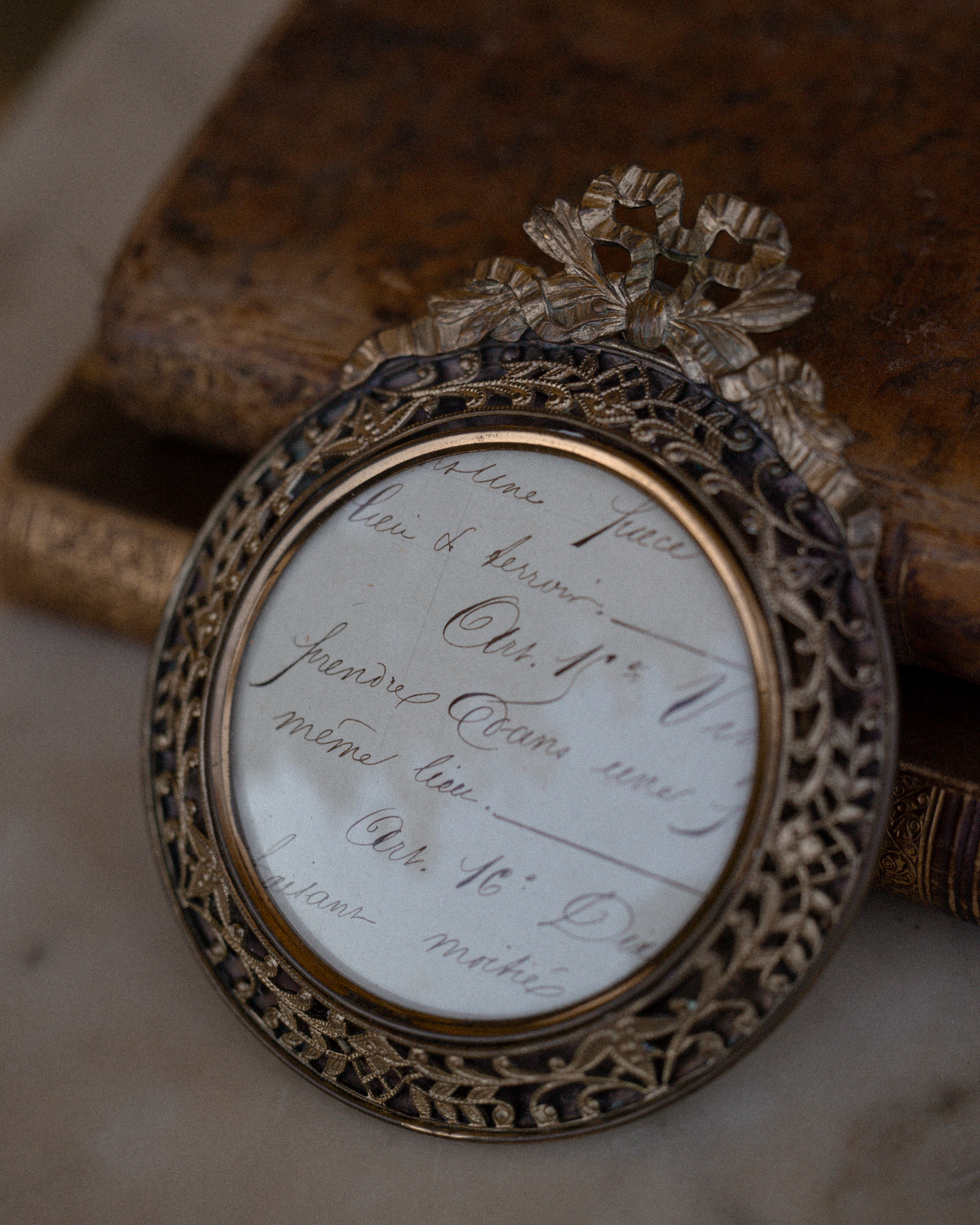 (A) Round Brass Frame w/ Bow Motif