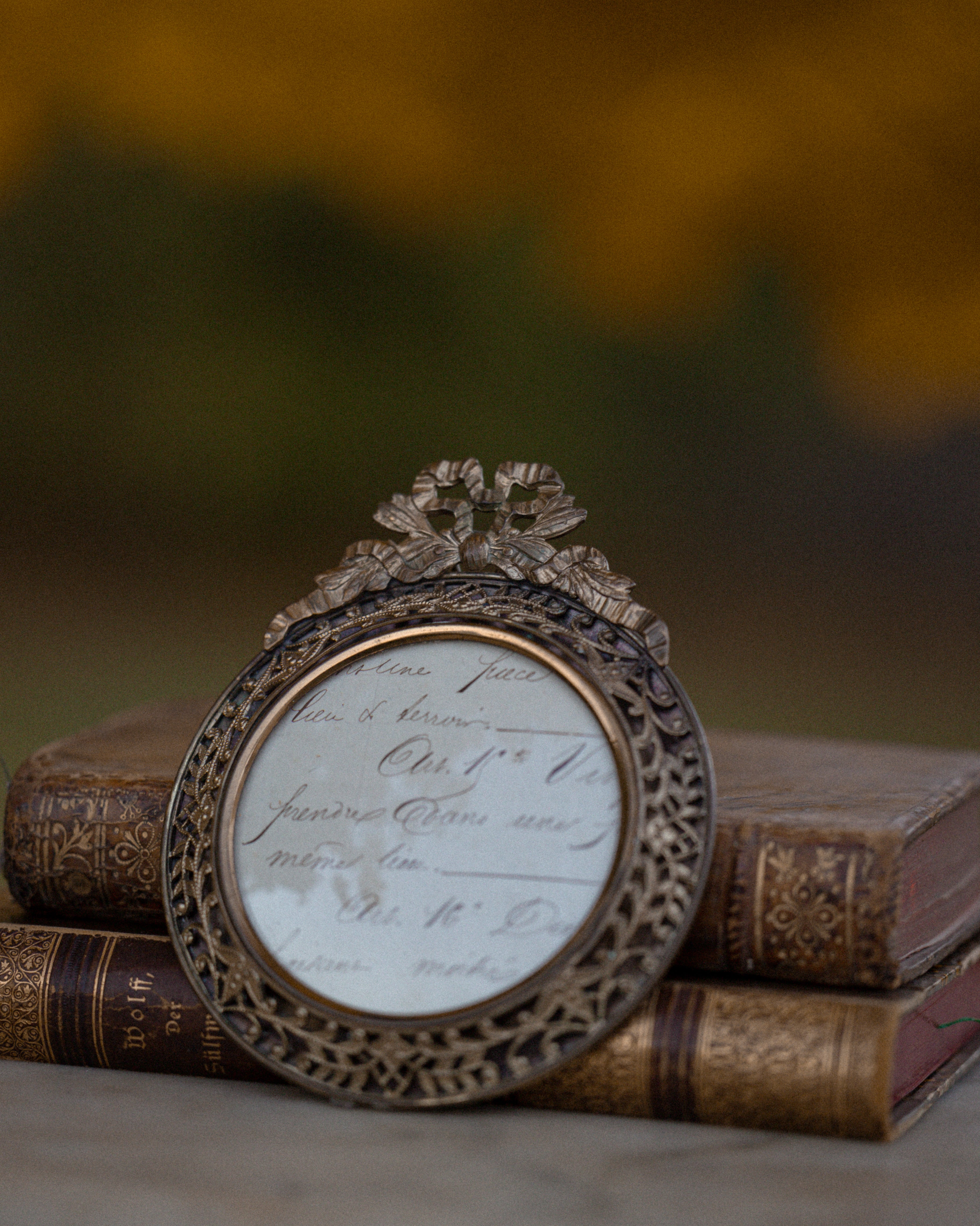 (A) Round Brass Frame w/ Bow Motif